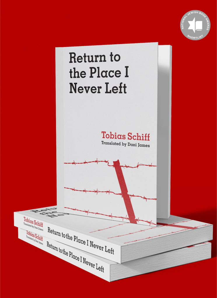 Return to the Place I Never Left Hardcover Book Stack in front of red background with award shortlist seal